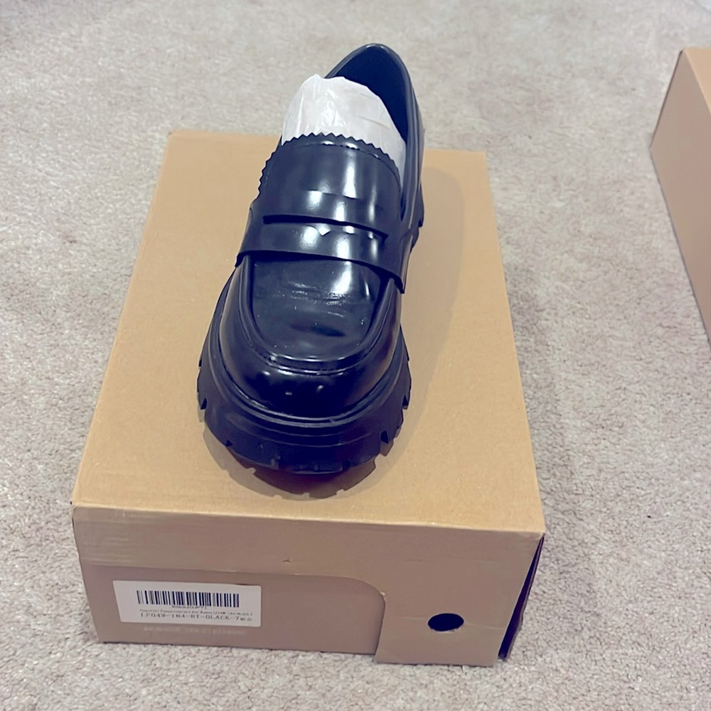 Black loafers